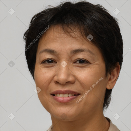 Joyful white adult female with short  brown hair and brown eyes