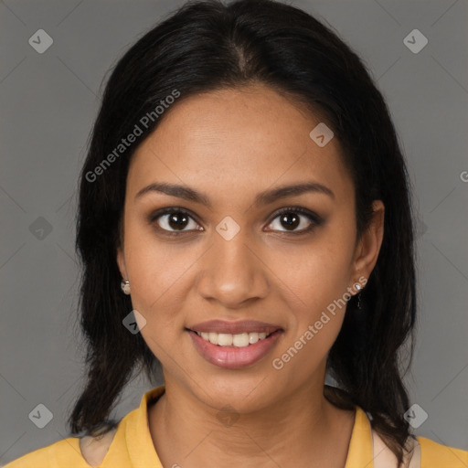 Joyful black young-adult female with medium  brown hair and brown eyes