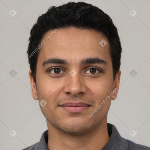 Joyful latino young-adult male with short  black hair and brown eyes