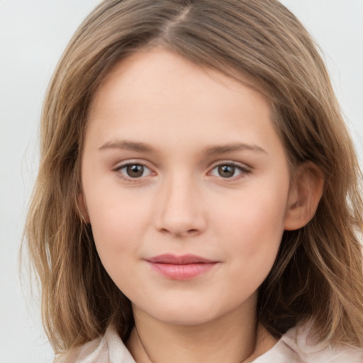 Joyful white child female with medium  brown hair and brown eyes