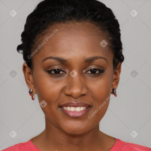 Joyful black young-adult female with short  brown hair and brown eyes