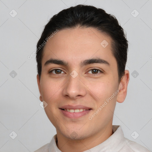 Joyful white young-adult male with short  brown hair and brown eyes