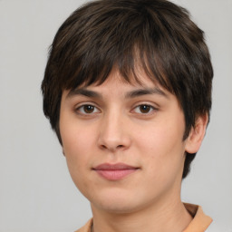 Neutral white young-adult female with short  brown hair and brown eyes