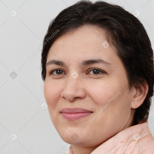 Joyful white young-adult female with medium  brown hair and brown eyes