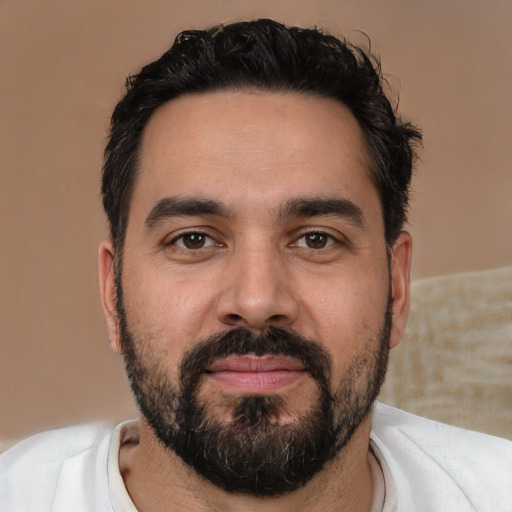 Neutral white adult male with short  black hair and brown eyes