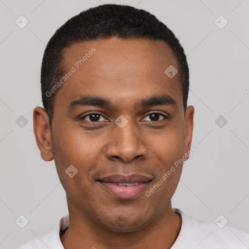 Joyful black young-adult male with short  black hair and brown eyes