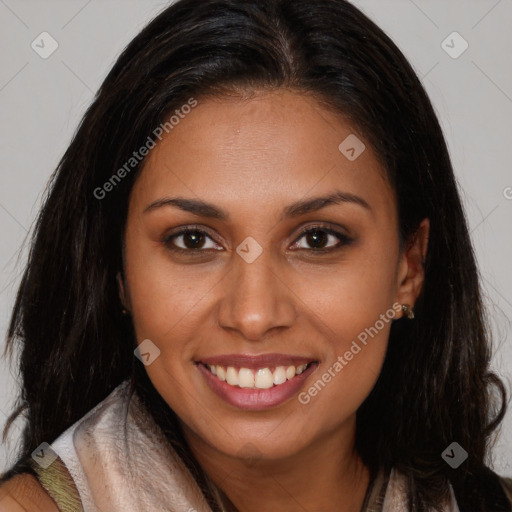 Joyful latino young-adult female with long  brown hair and brown eyes