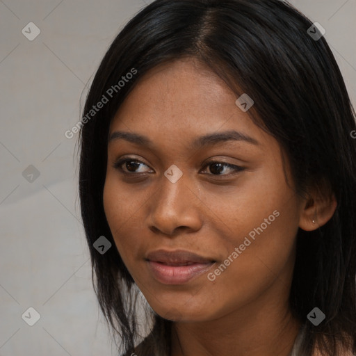 Joyful asian young-adult female with long  brown hair and brown eyes