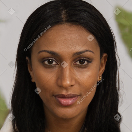 Joyful black young-adult female with long  brown hair and brown eyes