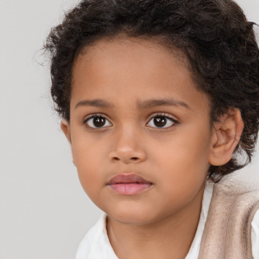 Neutral latino child female with short  brown hair and brown eyes