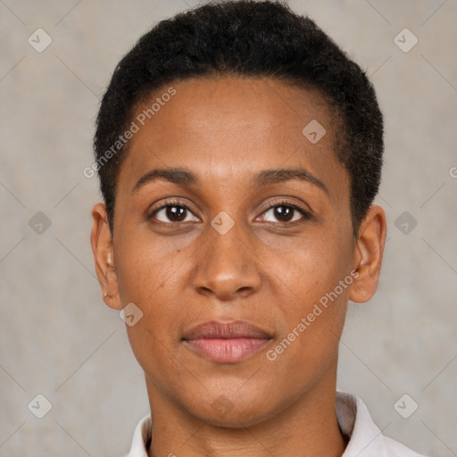 Joyful black young-adult female with short  brown hair and brown eyes