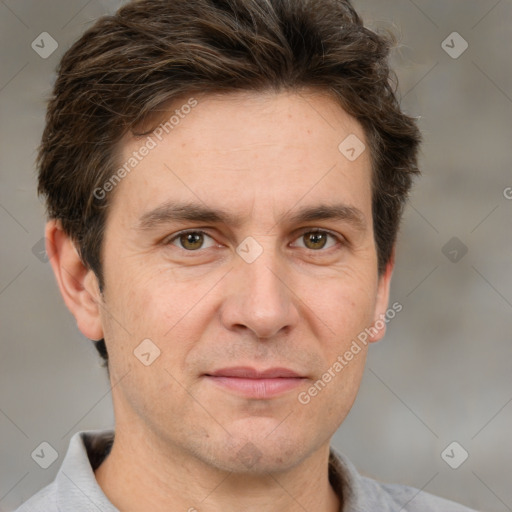 Joyful white adult male with short  brown hair and grey eyes