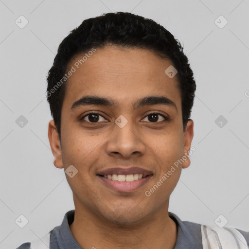 Joyful latino young-adult male with short  black hair and brown eyes