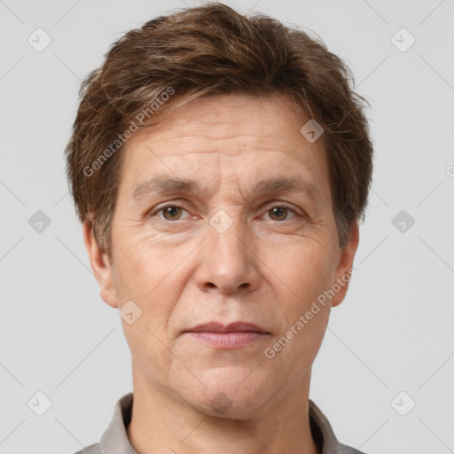 Joyful white adult male with short  brown hair and grey eyes