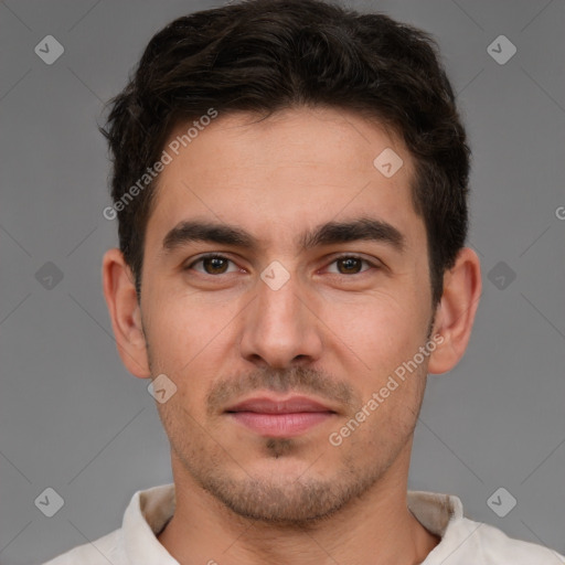 Joyful white young-adult male with short  brown hair and brown eyes