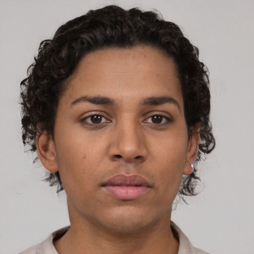 Neutral latino young-adult female with short  brown hair and brown eyes