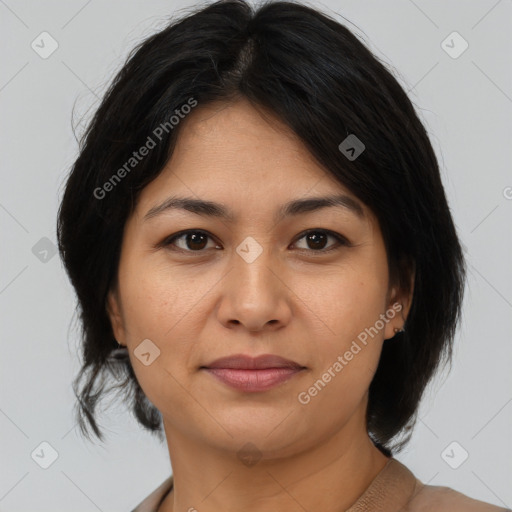 Joyful asian young-adult female with medium  brown hair and brown eyes