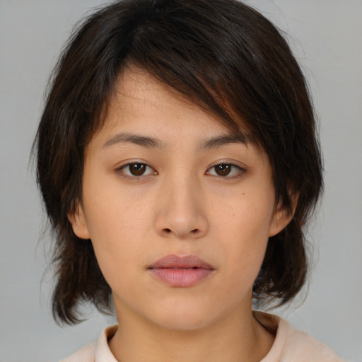 Neutral asian young-adult female with medium  brown hair and brown eyes