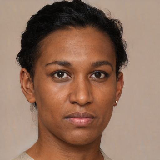 Neutral black young-adult female with short  brown hair and brown eyes
