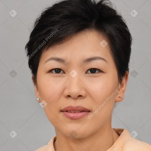 Joyful asian young-adult female with short  brown hair and brown eyes