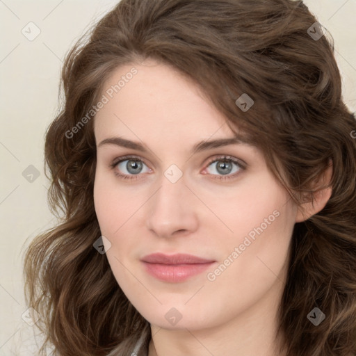 Joyful white young-adult female with long  brown hair and green eyes