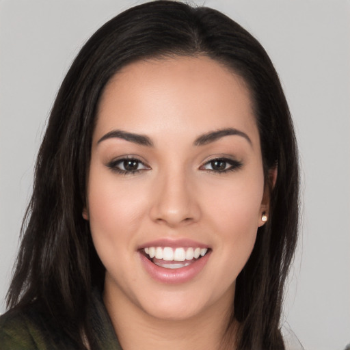 Joyful white young-adult female with long  black hair and brown eyes