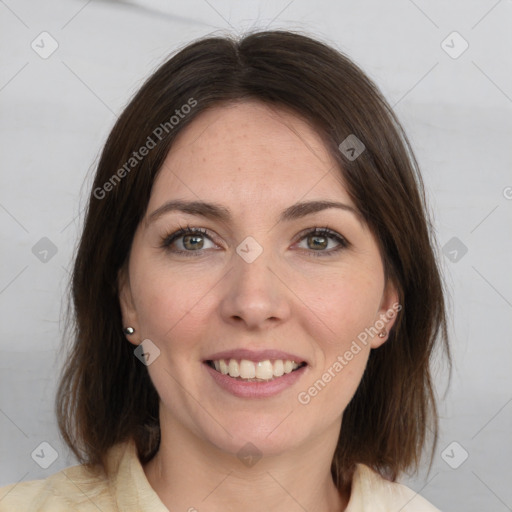 Joyful white young-adult female with medium  brown hair and grey eyes