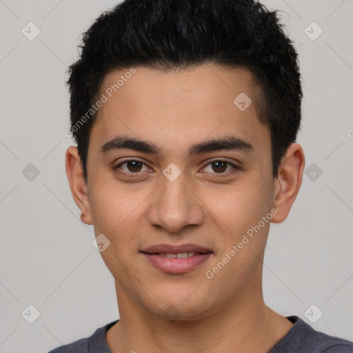 Joyful latino young-adult male with short  brown hair and brown eyes