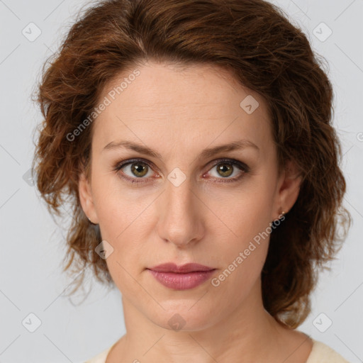 Joyful white young-adult female with medium  brown hair and green eyes