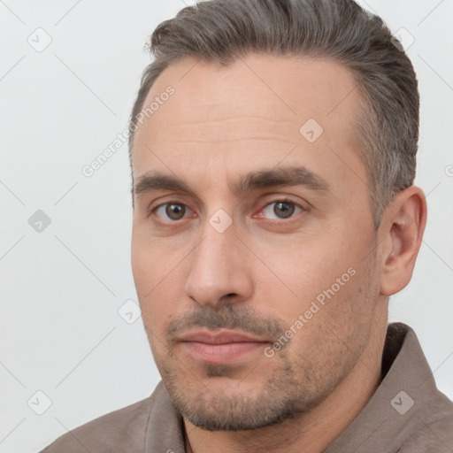 Neutral white adult male with short  brown hair and brown eyes