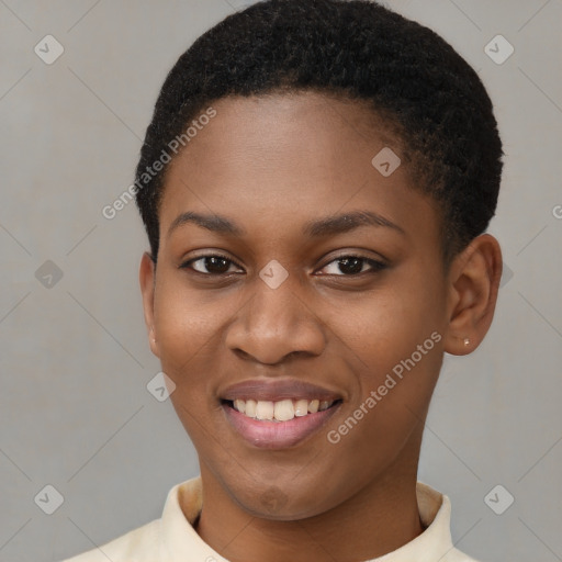 Joyful black young-adult female with short  brown hair and brown eyes