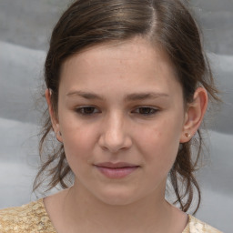 Joyful white child female with medium  brown hair and brown eyes