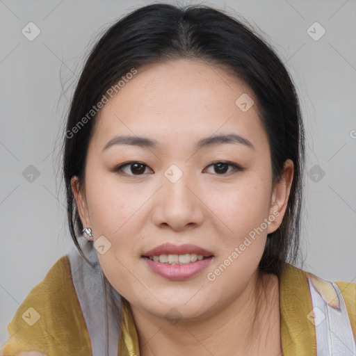 Joyful asian young-adult female with medium  brown hair and brown eyes