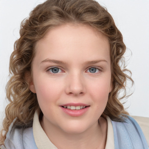 Joyful white child female with medium  brown hair and blue eyes