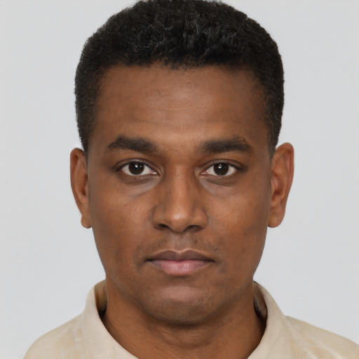 Neutral black young-adult male with short  brown hair and brown eyes