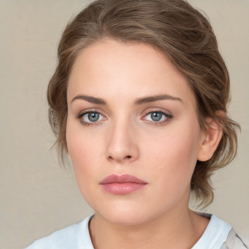 Neutral white young-adult female with medium  brown hair and blue eyes