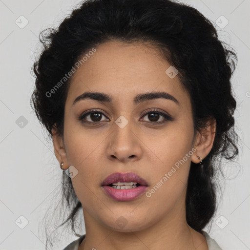 Joyful latino young-adult female with medium  brown hair and brown eyes