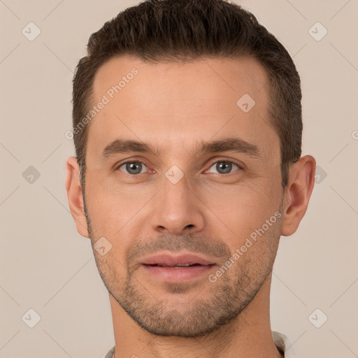 Joyful white young-adult male with short  brown hair and brown eyes