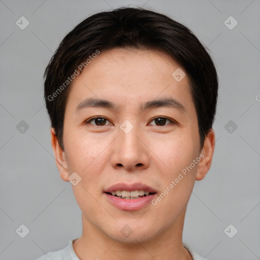 Joyful asian young-adult male with short  brown hair and brown eyes