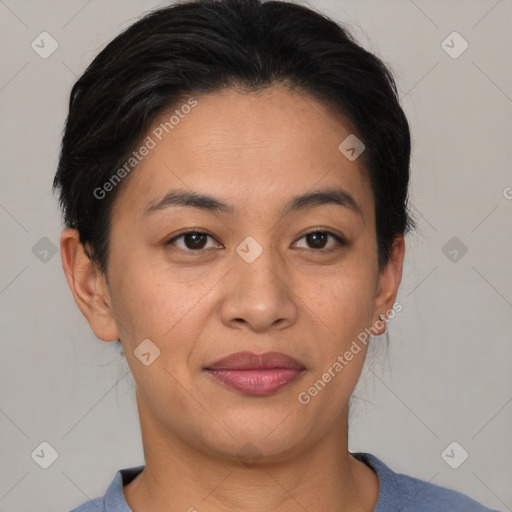 Joyful asian young-adult female with short  brown hair and brown eyes