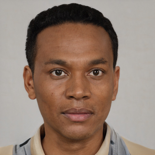 Neutral black young-adult male with short  black hair and brown eyes