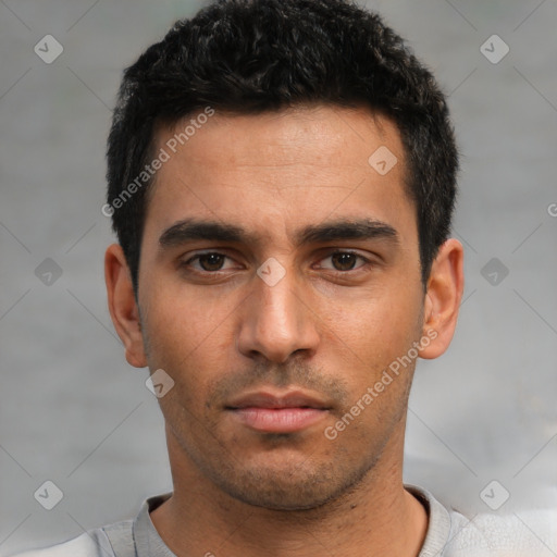Neutral white young-adult male with short  black hair and brown eyes