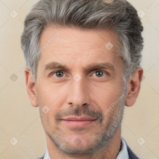 Neutral white adult male with short  brown hair and brown eyes