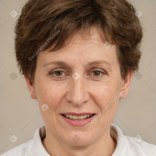 Joyful white adult female with short  brown hair and brown eyes