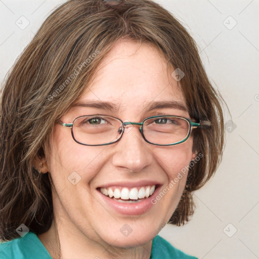 Joyful white adult female with medium  brown hair and blue eyes