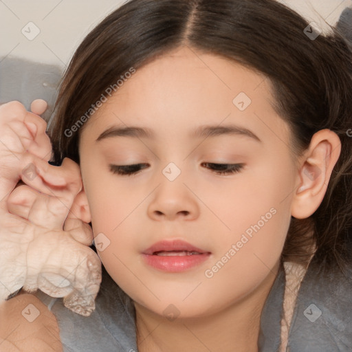 Joyful white child female with long  brown hair and brown eyes