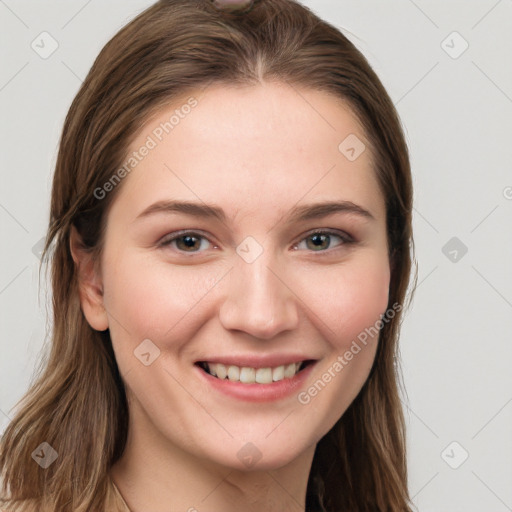 Joyful white young-adult female with long  brown hair and grey eyes