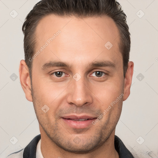 Joyful white young-adult male with short  brown hair and brown eyes