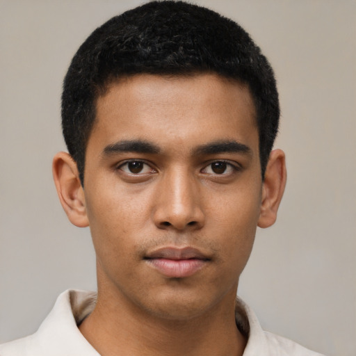 Neutral latino young-adult male with short  black hair and brown eyes