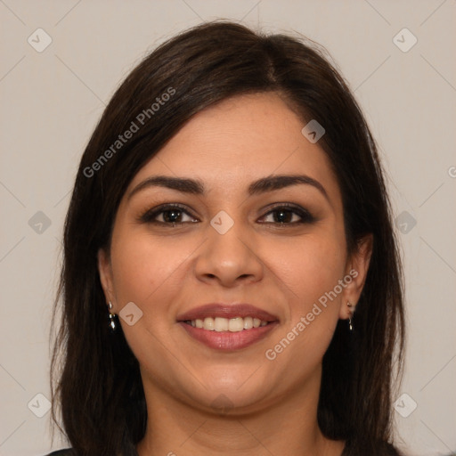 Joyful white young-adult female with long  brown hair and brown eyes